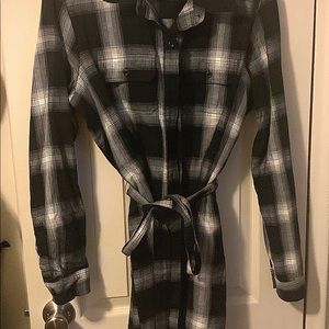 Black and white button-up dress with belt.